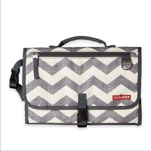 The Skip Hop Pronto Changing Station gray white diaper caddy portable